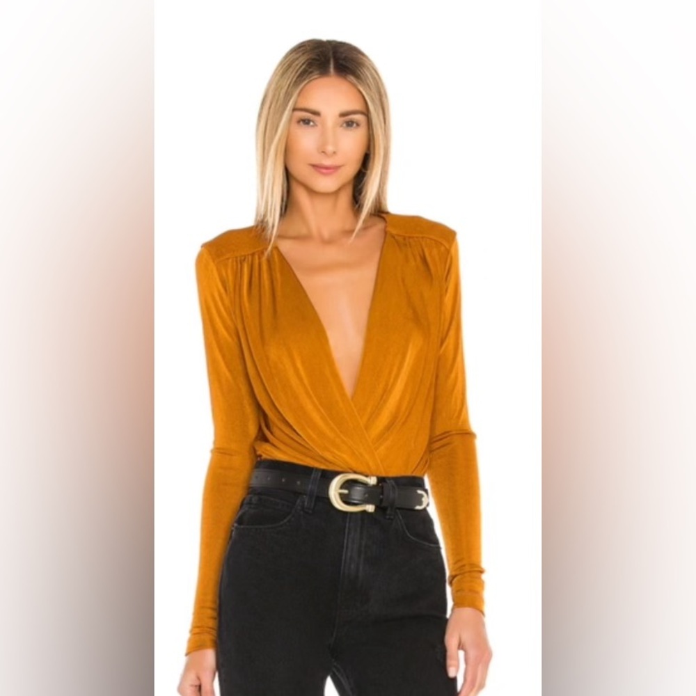 Brown Free people Turnt Surplice bodysuit.